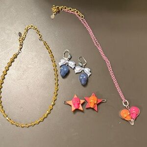 TT Skull heart necklace, hair clips, and yellow necklace